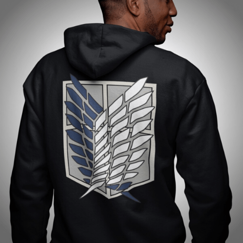 Man wearing a black fleece hoodie featuring Scout Corps Shield